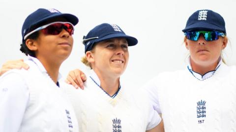 Sophia Dunkley, Heather Knight and Sophie Ecclestone before a Test in 2022