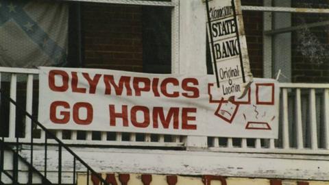 'Olympics go home' banner