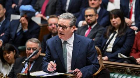 Prime Minister Sir Keir Starmer stands at the dispatch box in the House of Commons at PMQs