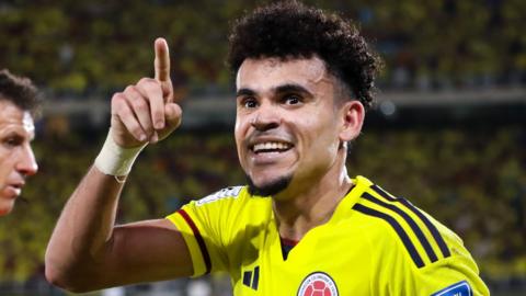 Luis Diaz celebrates scoring for Colombia