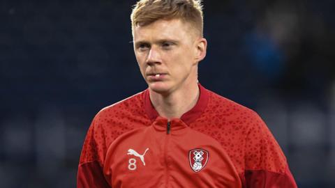 Sam Clucas warming up before a game for Rotherham