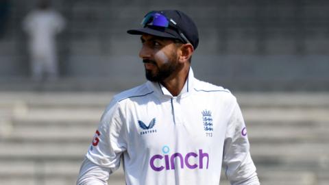 Shoaib Bashir standing on the pitch during England's second Test match against Pakistan in October