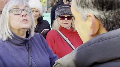 Protester and Rishi Sunak in Hampshire