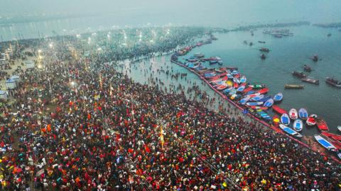 Tens of thousands of people gather along the banks of the Ganges and Yamuna river.