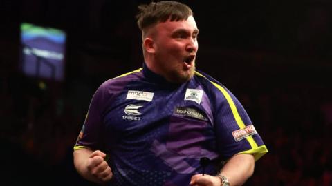 Luke Littler celebrates winning night nine of Premier League Darts in Belfast