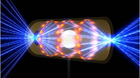 Artwork showing a pellet of hydrogen fuel inside a container called the hohlraum