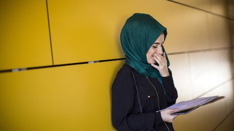 Girl receives her results at Stoke Newington School, London