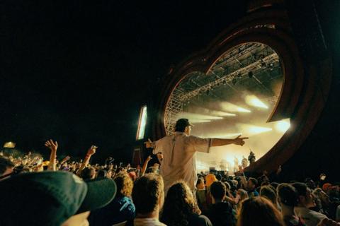 A large crowd watch The Streets at Love Saves The Day