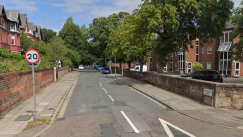 Normanton Avenue is a tree lined road with modern apartment housing on the right side and red brick Victorian terraces on the left hand side.