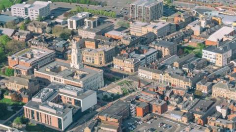 An aerial view of Barnsley town centre, with the town hall in the middle