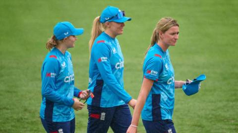 Left to right: England bowlers Charlie Dean, Sarah Glenn and Lauren Bell