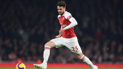 Carl Jenkinson of Arsenal runs with the ball during a Premier League match against AFC Bournemouth