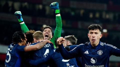 Manchester United celebrate beating Arsenal in FA Cup