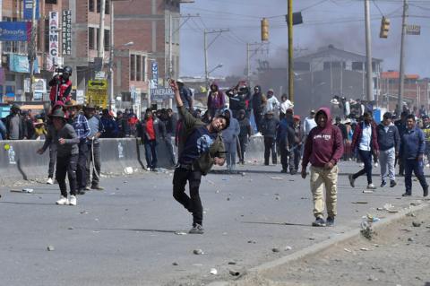 Supporters of President Luis Arce and former president Evo Morales clash in El Alto, Bolivia,