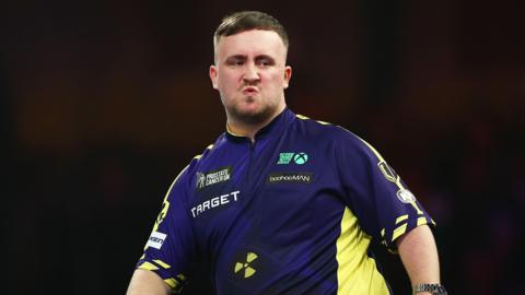 Luke Littler playing at the PDC World Darts Championship.