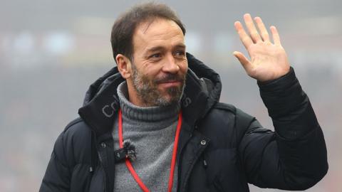 New Bristol Rovers head coach Inigo Calderon waves to fans