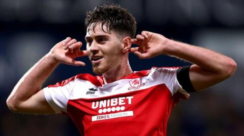 Hayden Hackney of Middlesbrough celebrates scoring his team's first goal during the Sky Bet Championship match between West Bromwich Albion FC and Middlesbrough FC at The Hawthorns on October 01, 2024 in West Bromwich, England