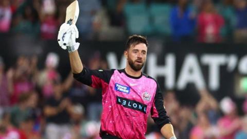 James Vince raising his bat after hitting a century.