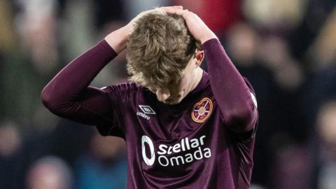 James Wilson of Hearts holds his head in his hands