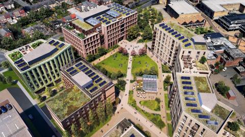 An illustrative image of Knowsley Council's plans, showing an aerial view of several new office buildings with solar panels on the roofs. 