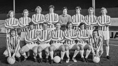 Stoke City squad photo including Mike Pejic and George Eastham in February 1972