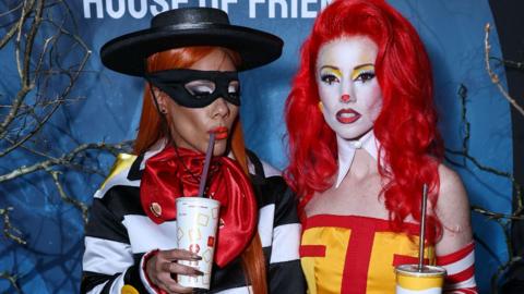 Alex Scott and Jess Glynne attend Casamigos Tequila: The 2nd Haunted House of Friends' Halloween Party at Jack Solomons on October 31, 2024 in London, England