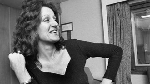 A black and white image of Germaine Greer.