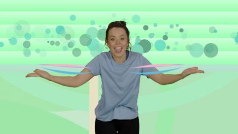 Evie Pickerill in a blue t-shirt dancing on a sports pitch with a background of green and blue circles.