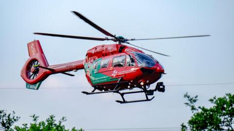 Welsh Air Ambulance helicopter in the sky