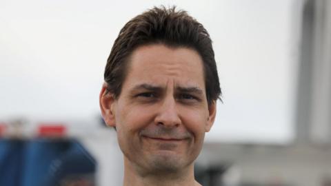 Close up of Michael Kovrig, faintly smiling, in Toronto following his release from detention in China in September 2021.