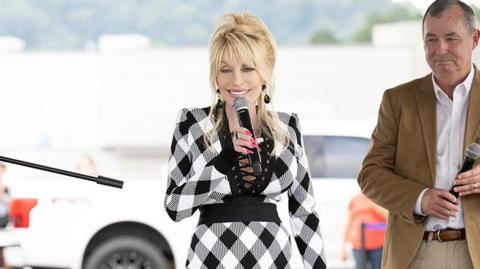 Dolly Parton speaks at a news conference in Newport, Tennessee