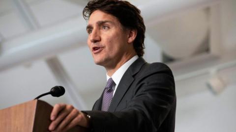 Canada's Prime Minister Justin Trudeau and France's President Emmanuel Macron (not pictured) attend a press conference in Montreal, Quebec, Canada, September 26, 2024.