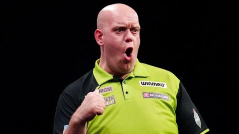 Michael van Gerwen celebrates during Premier League Darts night 15 in Leeds