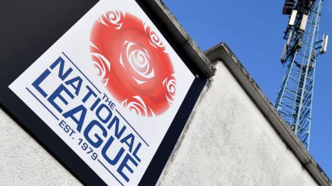 National League sign and floodlight