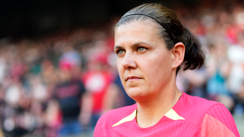 Christine Sinclair walks on to a pitch