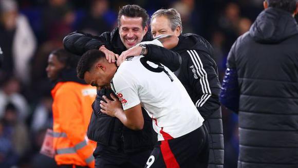 Fulham manager Marco Silva celebrates with match-winner Rodrigo Muniz