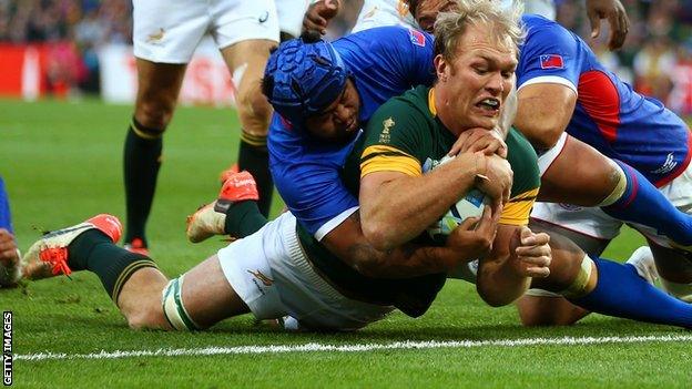 Schalk Burger of South Africa goes over to score his teams third try during the 2015 Rugby World Cup Pool B match between South Africa and Samoa