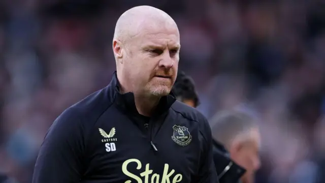 Sean Dyche, Manager of Everton, looks on as he walks towards the tunnel at half-time during the Premier League match between Manchester United FC and Everton FC at Old Trafford