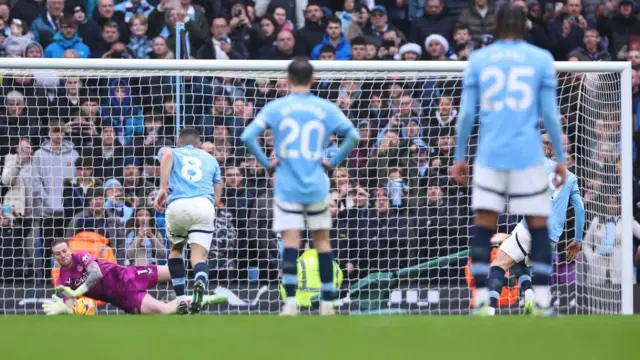 Jordan Pickford saves a penalty for Everton