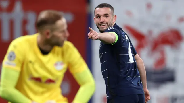 John McGinn celebrates scoring goal against RB Leipzig