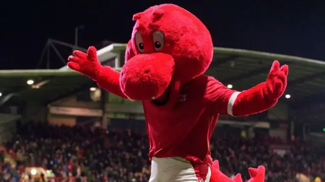 Wrexham mascot Wrex the Dragon at the Racecourse