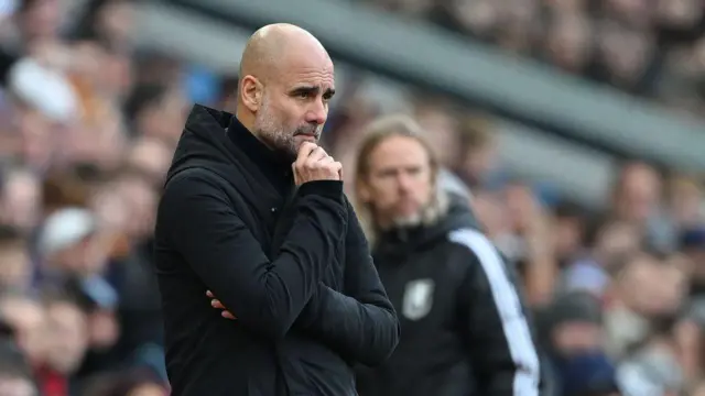 Pep Guardiola, Manager of Manchester City, reacts during the Premier League match between Aston Villa FC and Manchester City FC at Villa Park on December 21, 2024