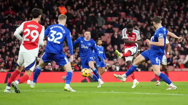 Arsenal's Bukayo Saka shoots at goal