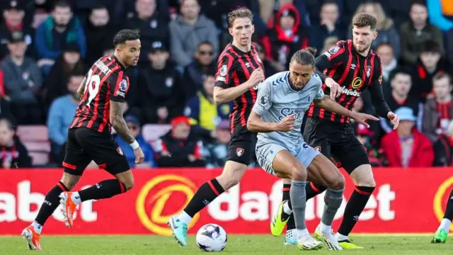 Dominic Calvert-Lewin of Everton is closed down by Justin Kluivert, Illia Zabarnyi and Chris Mepham of Bournemouth during the Premier League match between AFC Bournemouth and Everton FC at Vitality Stadium