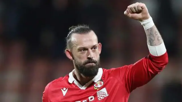 Steven Fletcher celebrates his late goal for Wrexham against Peterborough