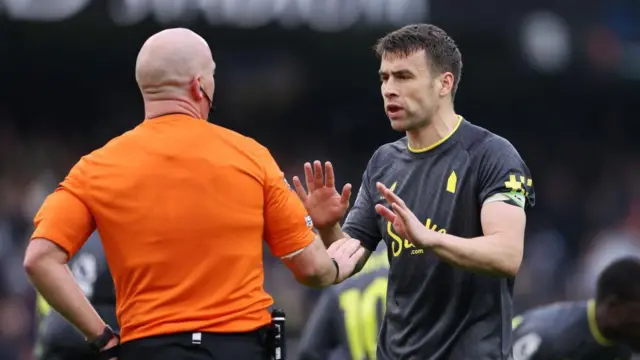 Seamus Coleman talks to the referee against Manchester City