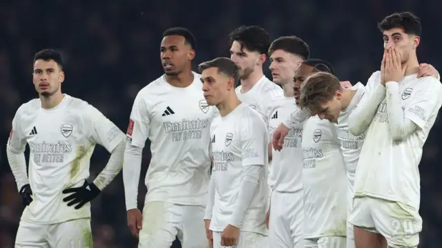 Arsenal players during their penalty shootout defeat to Manchester United.