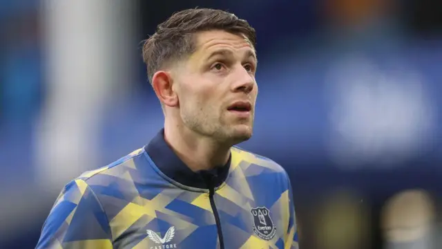 James Tarkowski of Everton looks on as he warms up prior to the Premier League match between Everton FC and Chelsea FC at Goodison Park on December 22, 2024