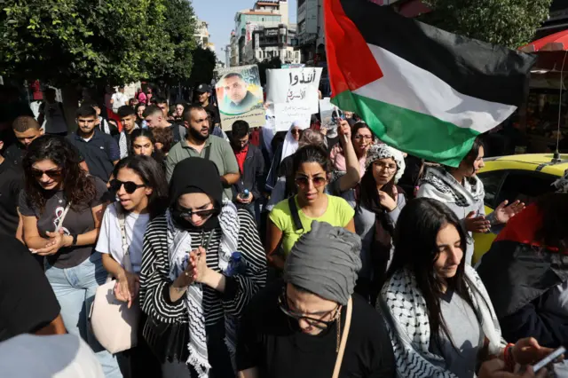 Relatives of Palestinian prisoners in Israeli jails demand for their release and in support of those in Gaza in Nablus, in the West Bank