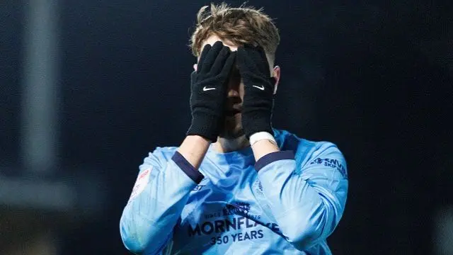 Crewe goalscorer Jack Lankester covers his face with his hands